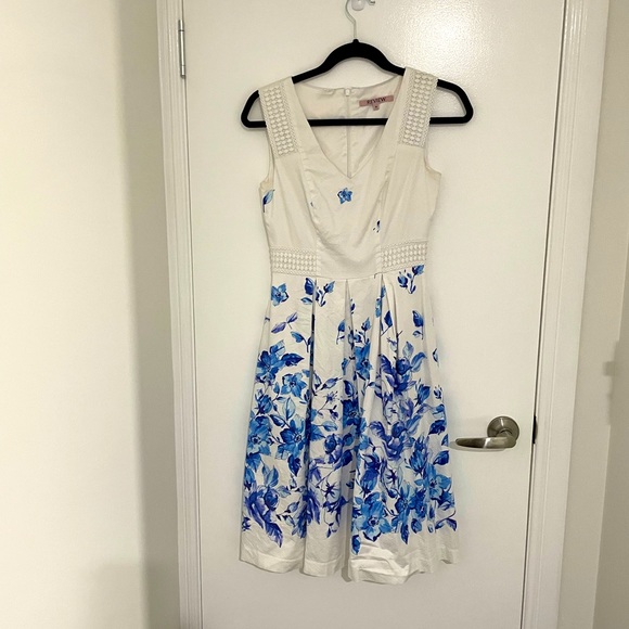 Review Dresses & Skirts - Sold Review Size 6 White Dress with blue flowers